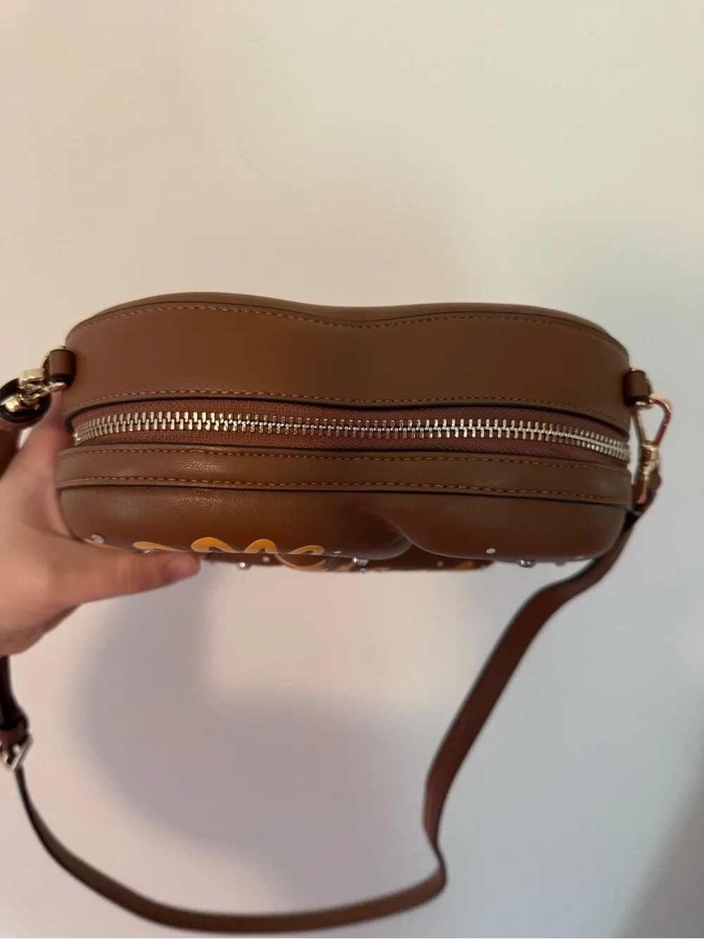 kate spade Brown & Cream Pretzel-Shaped Crossbody Bag with Mustard Packet Zipper - Picture 8 of 17